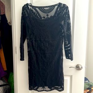 Woman’s small lace dress from Express with stretchy silky liner